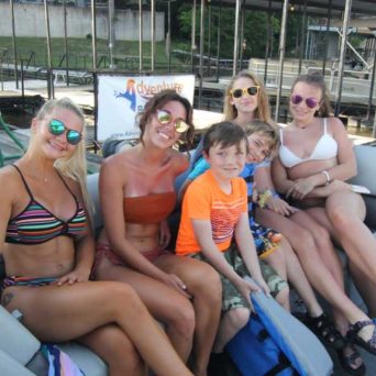 a group of people sitting posing for the camera