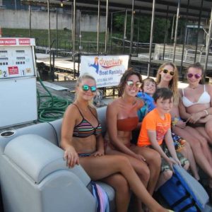 a group of people sitting in a chair