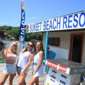 a person standing in front of a sign