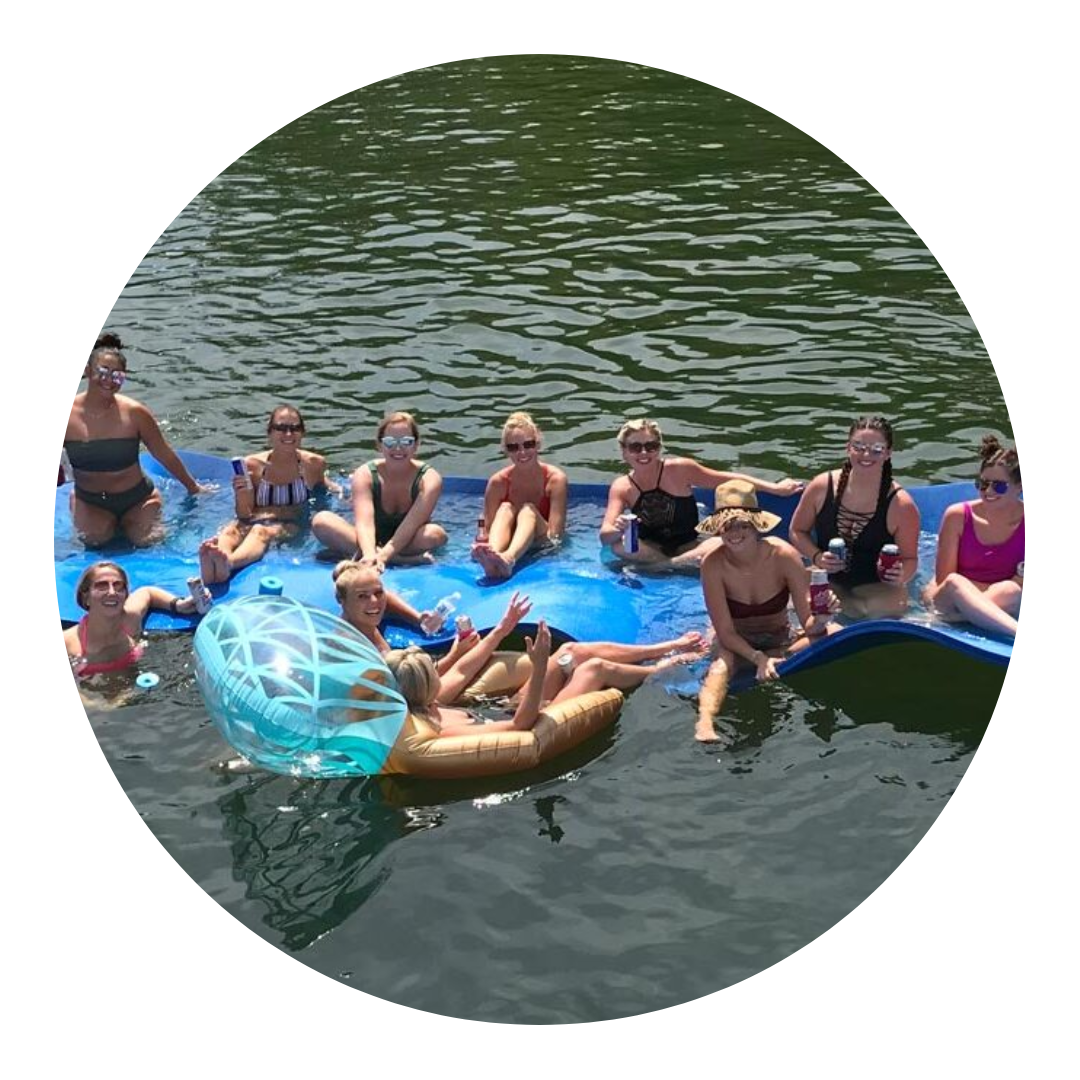 a group of people swimming in a body of water