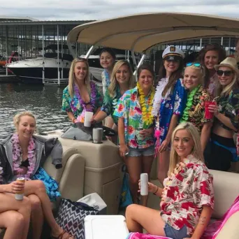 a group of people sitting posing for the camera