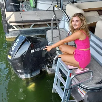 a woman sitting on a boat