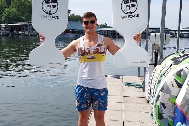 a person that is standing in the water