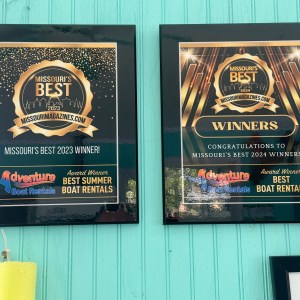 a blackboard sign on the side of a building