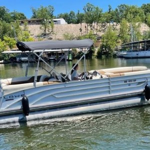 a small boat in a body of water