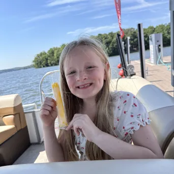 a woman sitting on a boat