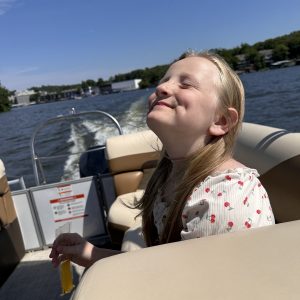 a person sitting on a boat